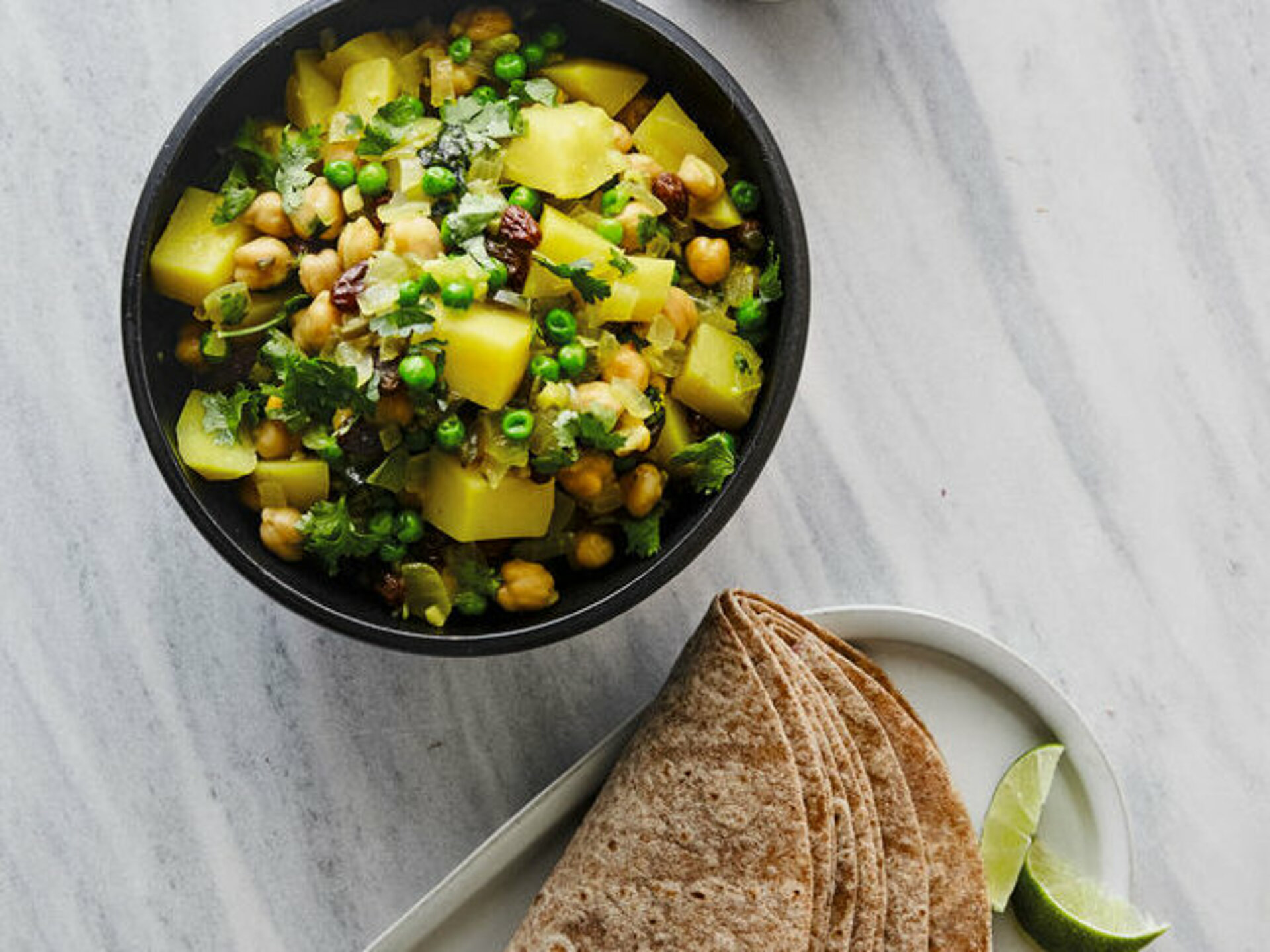 Kikkererwtencurry met burrito’s en munt-chilisaus Kikkererwtencurry en munt-chilisaus
