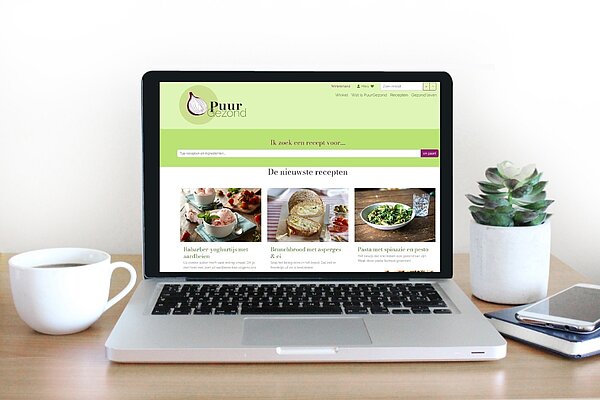 Beeldscherm met website PuurGezond en favorietenknop